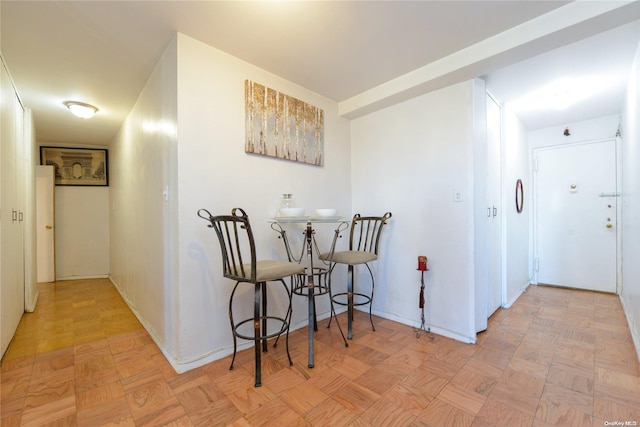 hallway featuring light parquet floors