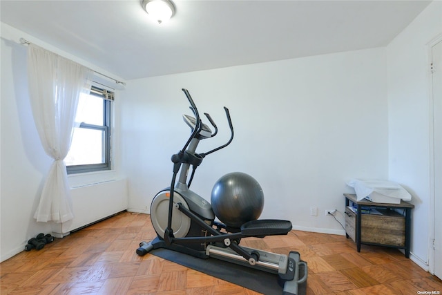 exercise room with parquet flooring