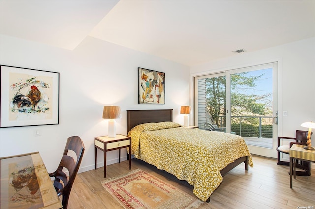 bedroom featuring hardwood / wood-style flooring