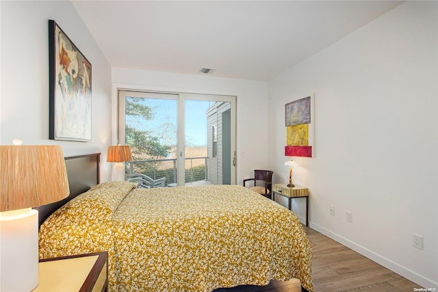 bedroom featuring hardwood / wood-style flooring