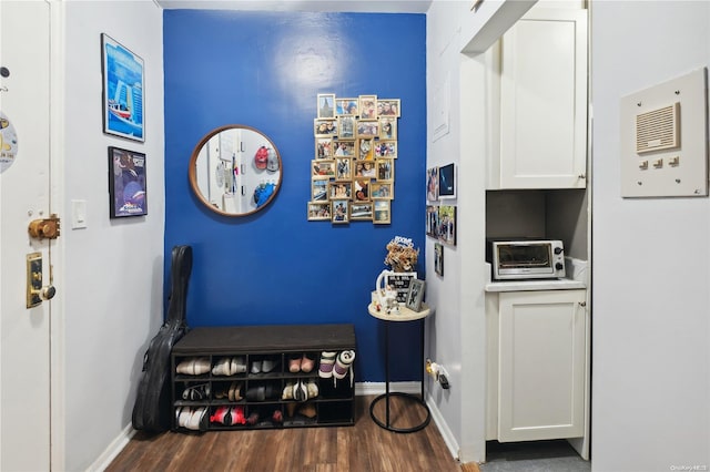 interior space with dark wood-type flooring