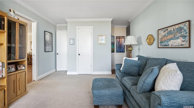 living room with ornamental molding and light carpet