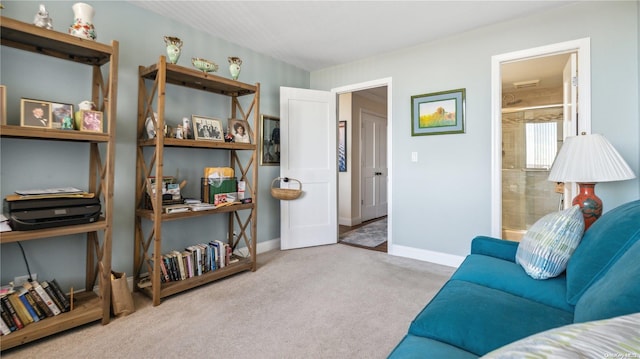 sitting room with light colored carpet