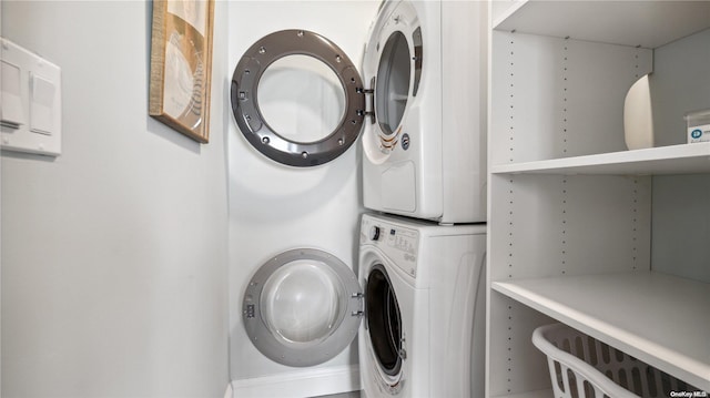 laundry room featuring stacked washer and dryer