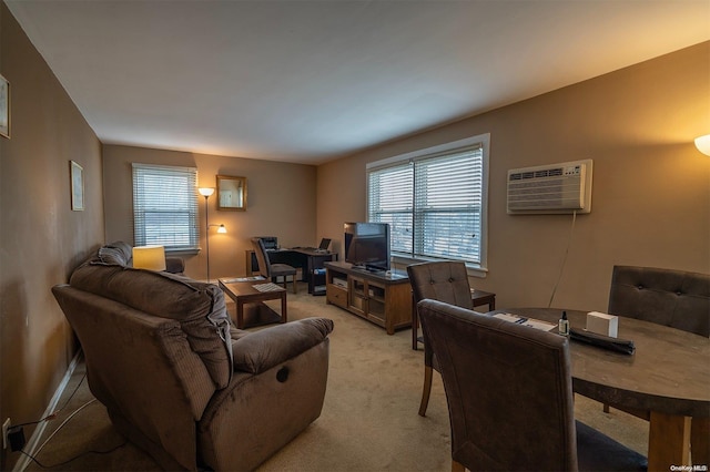 living room featuring light colored carpet and a wall unit AC