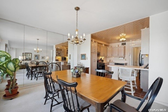 dining room featuring a chandelier