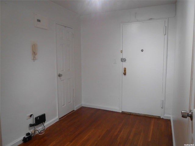 interior space with dark hardwood / wood-style floors