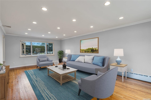 living room featuring baseboard heating, crown molding, and light hardwood / wood-style flooring