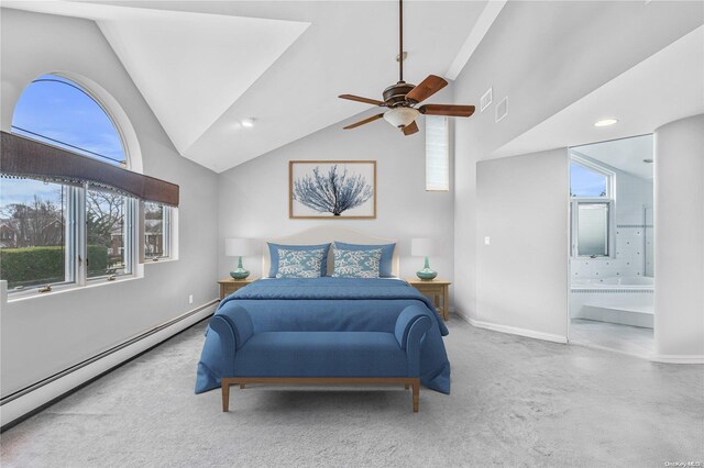 4 Midfarm Rd, Rockville Centre, NY 11570 - bedroom with a baseboard heating unit, vaulted ceiling, ensuite bath, ceiling fan, and carpet flooring