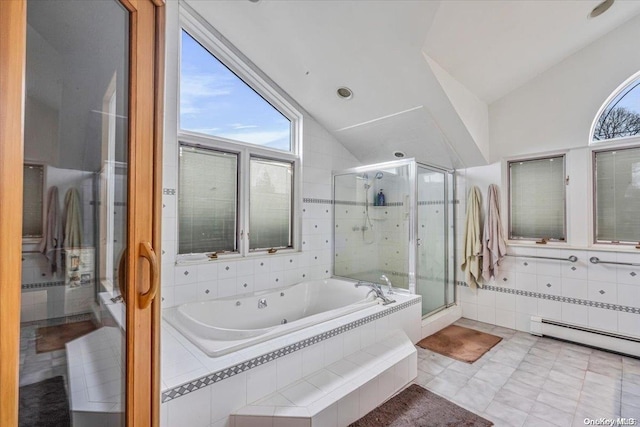 bathroom featuring baseboard heating, tile patterned flooring, independent shower and bath, and vaulted ceiling