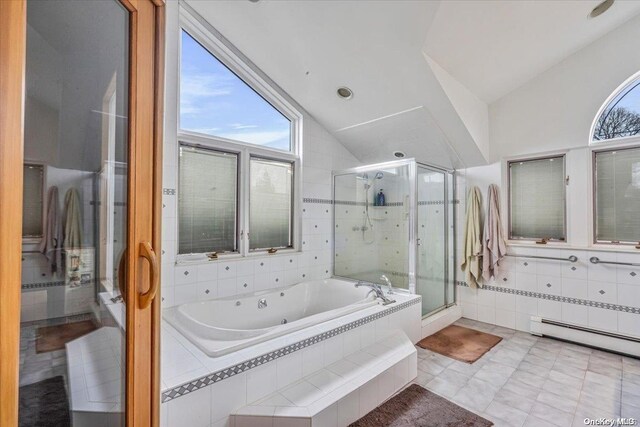 4 Midfarm Rd, Rockville Centre, NY 11570 - bathroom featuring a baseboard radiator, a whirlpool tub, a stall shower, lofted ceiling, and healthy amount of natural light