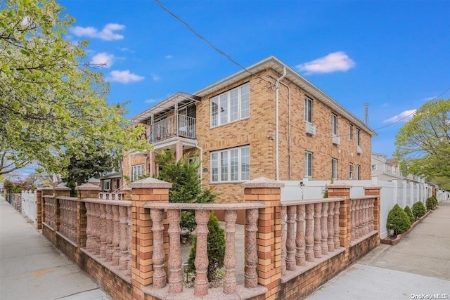 view of property exterior featuring a balcony