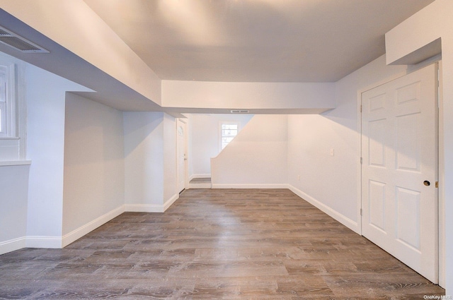 basement featuring hardwood / wood-style flooring