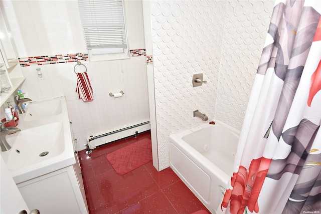 bathroom with shower / bath combo with shower curtain, tile patterned flooring, a baseboard radiator, and double sink