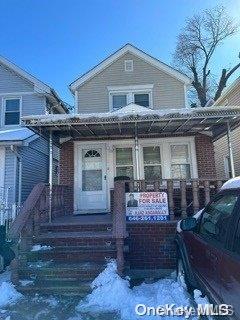 view of front of house with covered porch