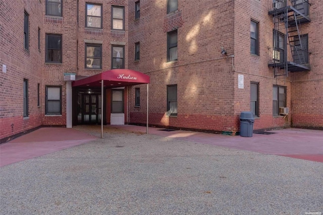 view of building exterior with cooling unit