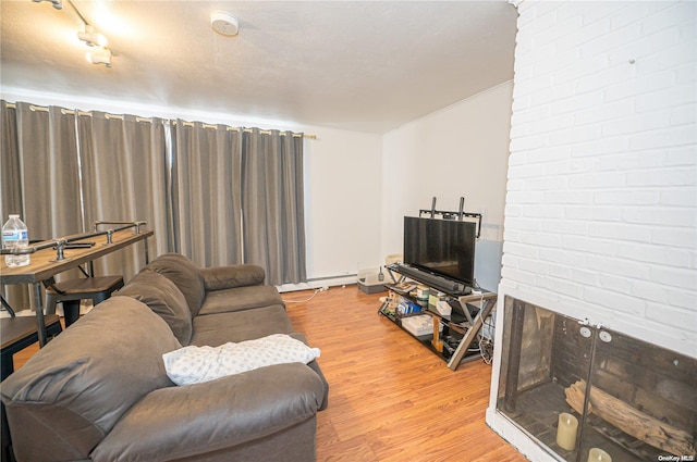 31 William St, Copiague, NY 11726 - living room featuring light wood-style flooring