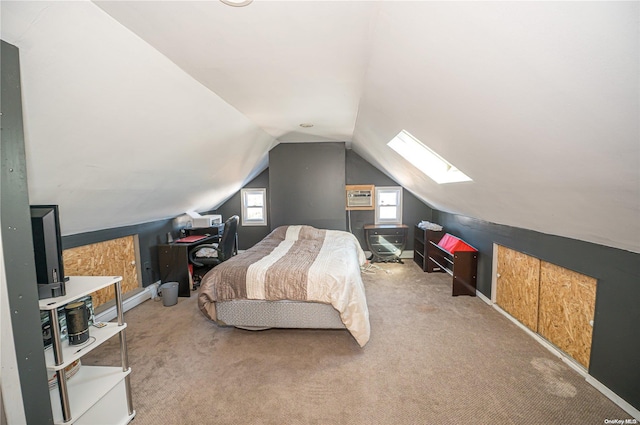 carpeted bedroom with lofted ceiling