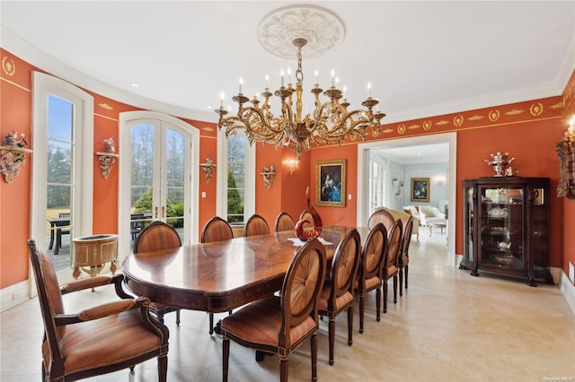 dining space with an inviting chandelier, ornamental molding, and french doors