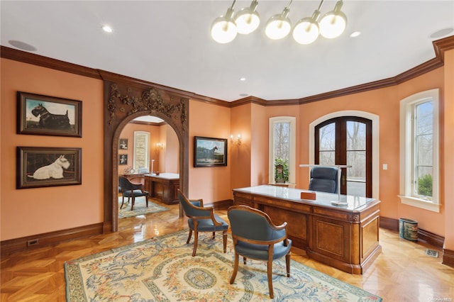 office with crown molding and light parquet flooring