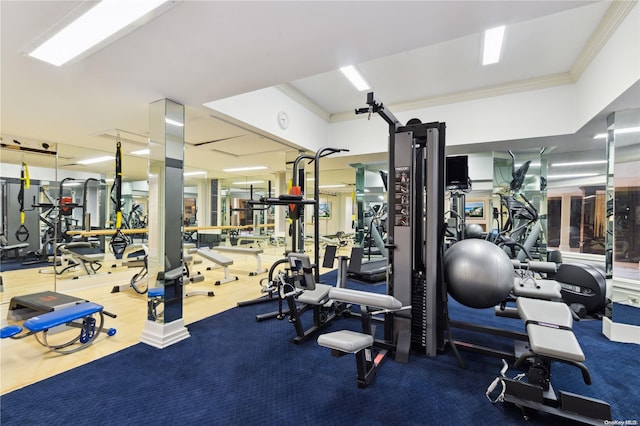 gym with ornamental molding