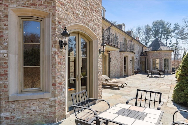 view of patio featuring french doors