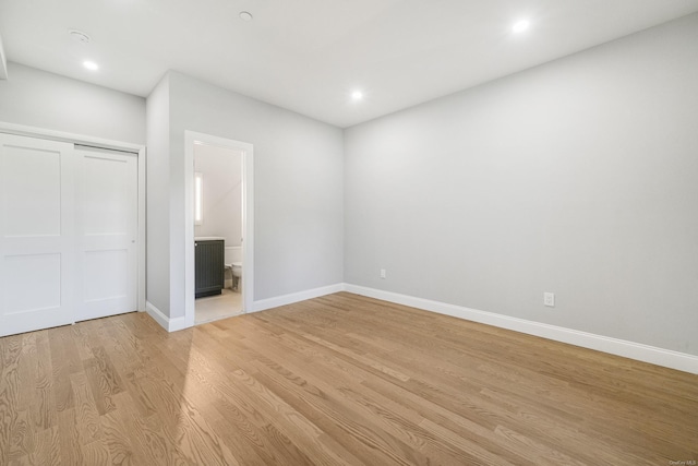 empty room featuring light hardwood / wood-style floors