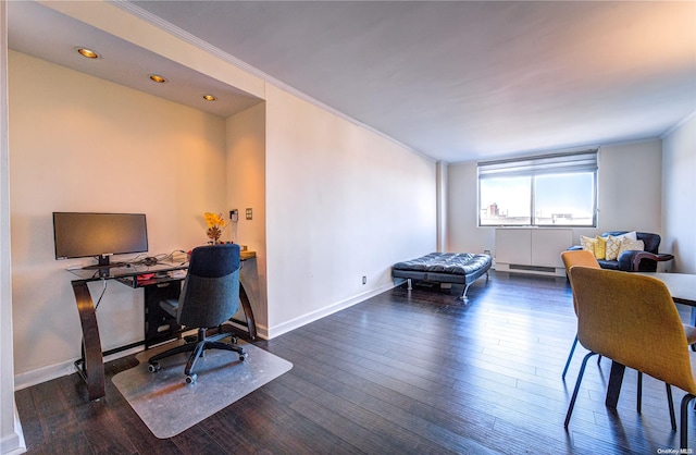 office with baseboard heating, dark hardwood / wood-style floors, and ornamental molding