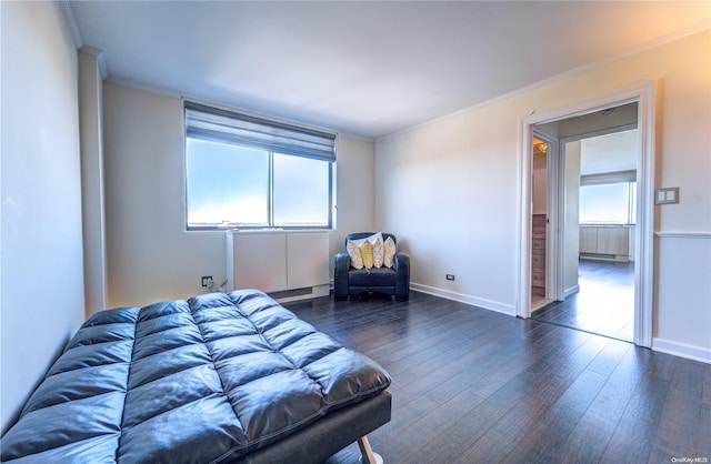 bedroom featuring dark hardwood / wood-style flooring and crown molding