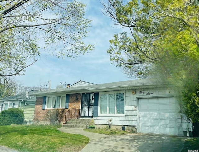 single story home with a garage and a front lawn