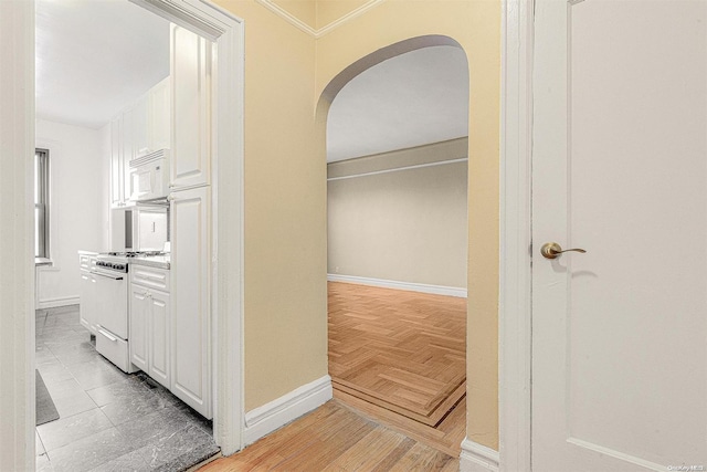 hallway featuring light parquet floors