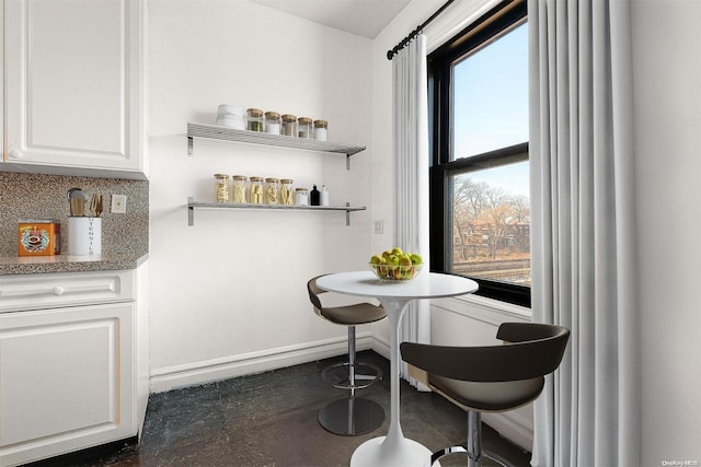 dining space featuring a wealth of natural light