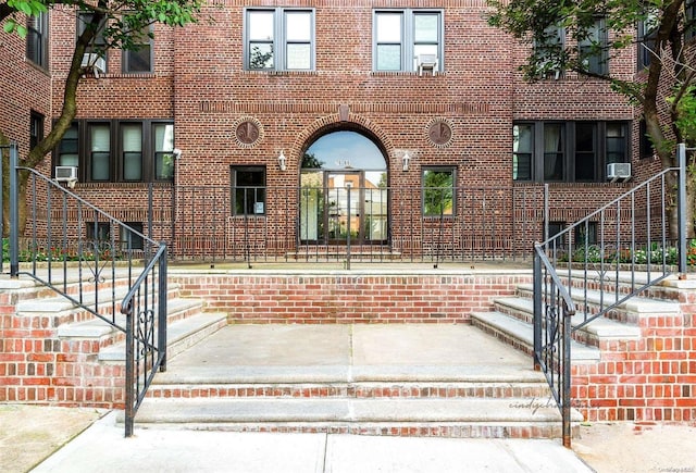 view of front facade with cooling unit