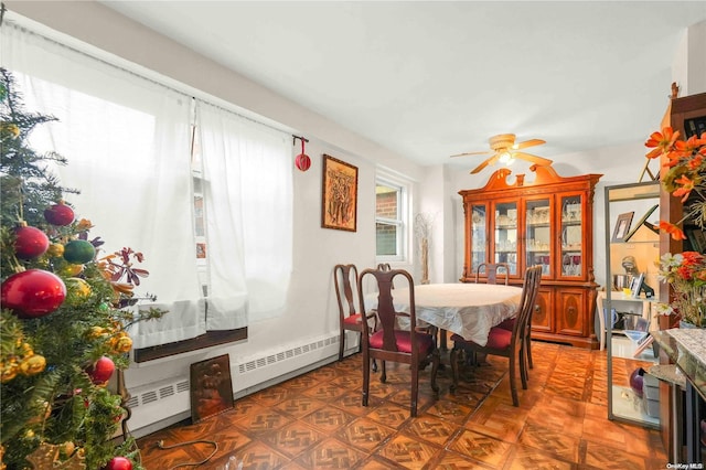 dining space with ceiling fan