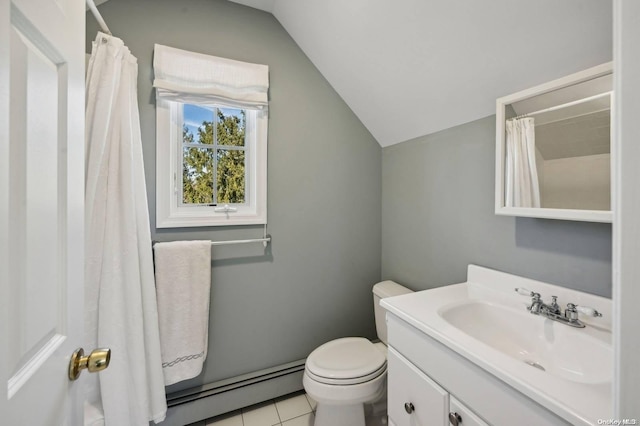 bathroom with toilet, vanity, tile patterned floors, and lofted ceiling