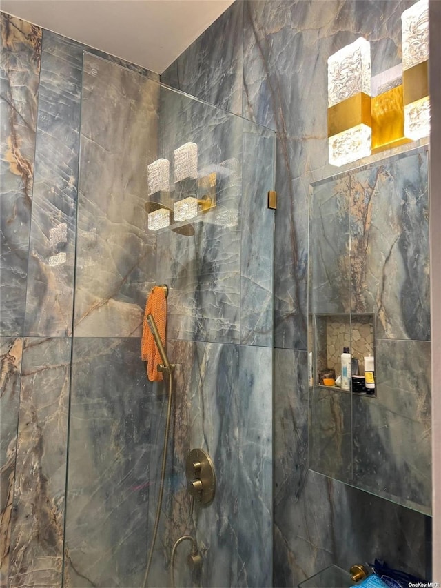 details featuring a tile shower