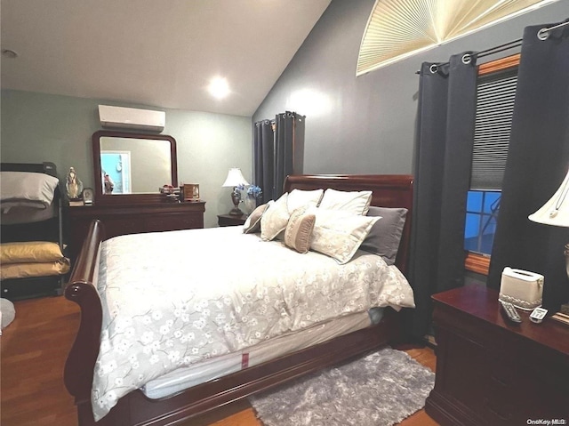 bedroom with hardwood / wood-style flooring, a wall mounted AC, and lofted ceiling