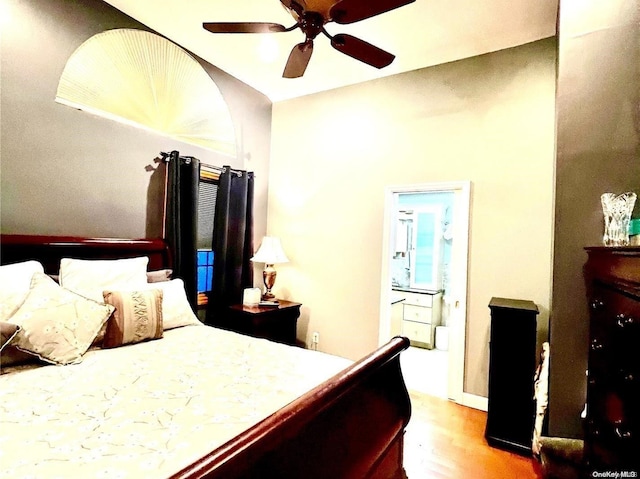 bedroom with ceiling fan and wood-type flooring