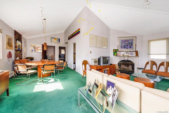 living room featuring carpet and vaulted ceiling