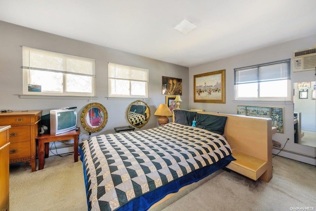 carpeted bedroom with a baseboard radiator, a wall unit AC, and multiple windows