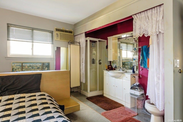 carpeted bedroom featuring a wall mounted air conditioner and sink