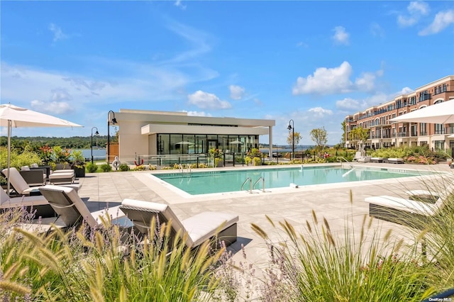 view of swimming pool featuring a patio