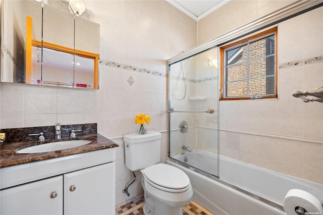 full bathroom featuring decorative backsplash, bath / shower combo with glass door, vanity, tile walls, and toilet