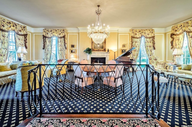 carpeted dining room with an inviting chandelier and ornamental molding