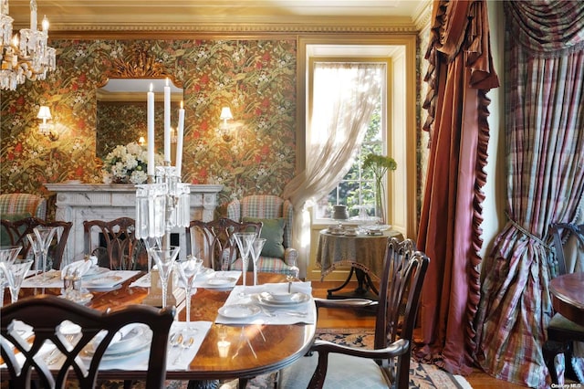 dining room with crown molding, plenty of natural light, and wood-type flooring