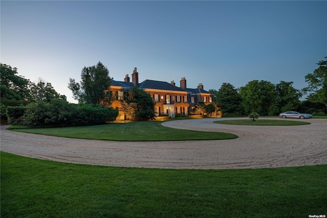 view of front of home with a front lawn