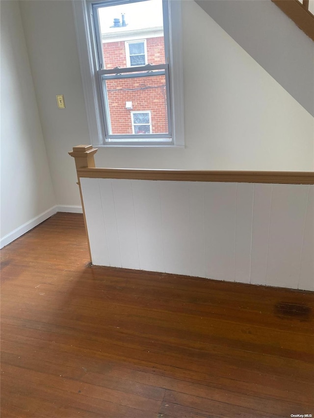 bonus room with wood finished floors