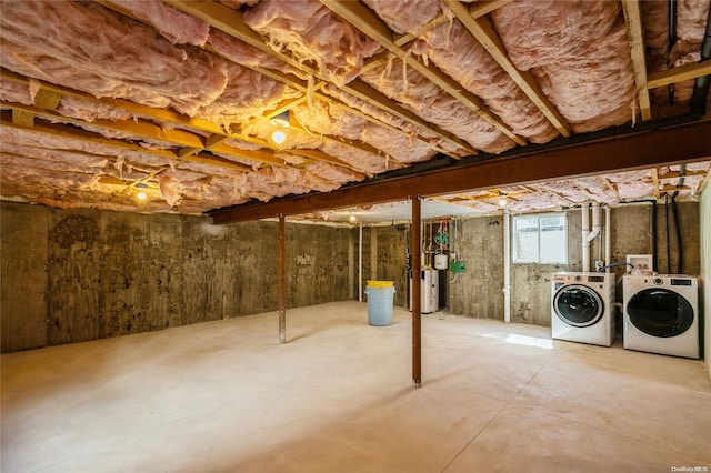 basement with washing machine and clothes dryer