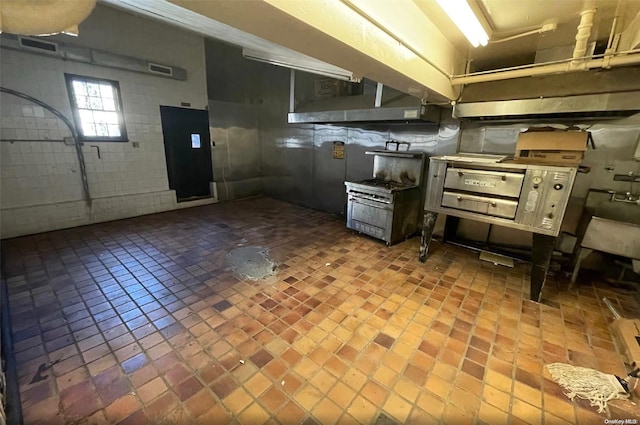 kitchen featuring exhaust hood