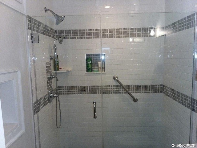 bathroom with an enclosed shower